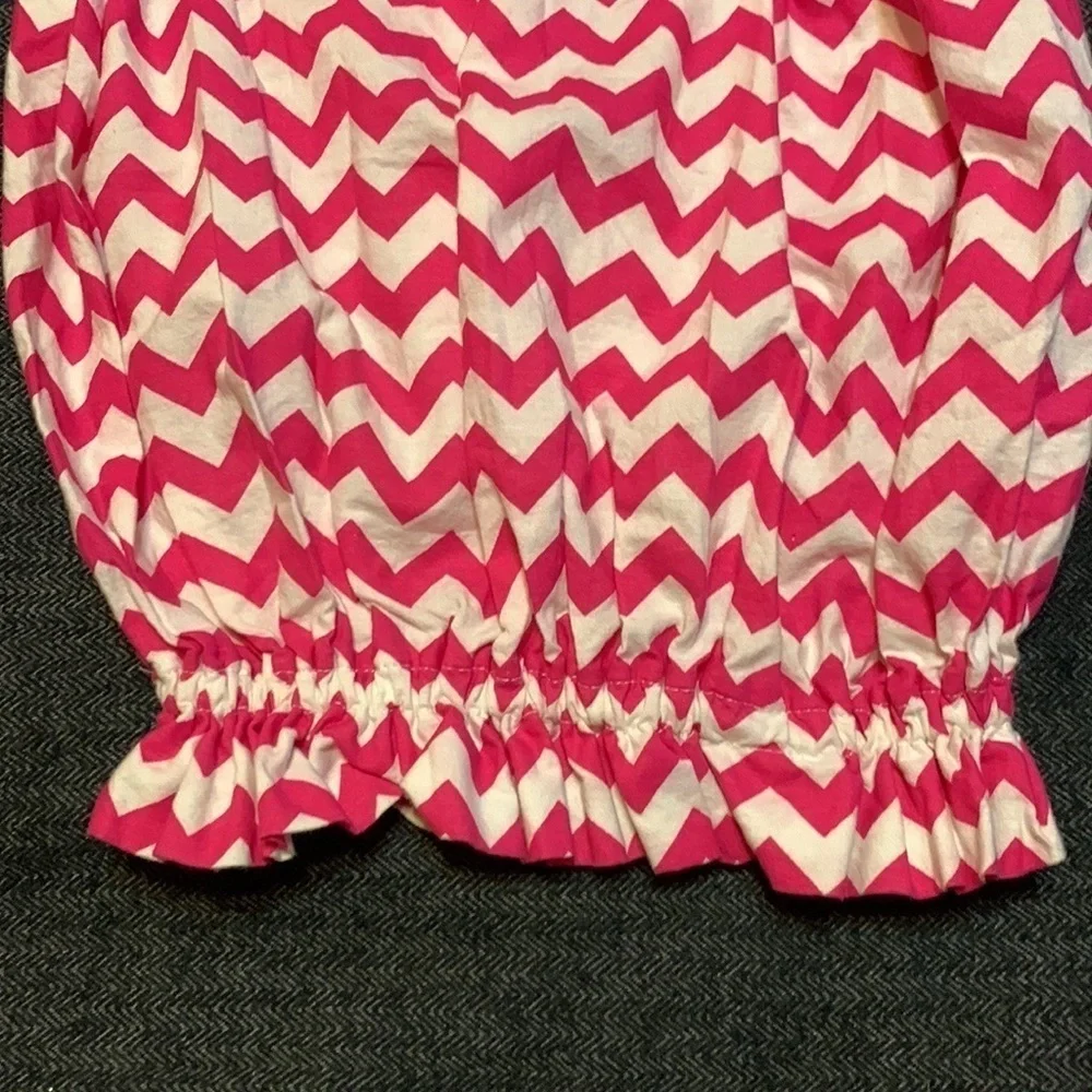 Toodles newborn gown with pink and white chevron print and flower